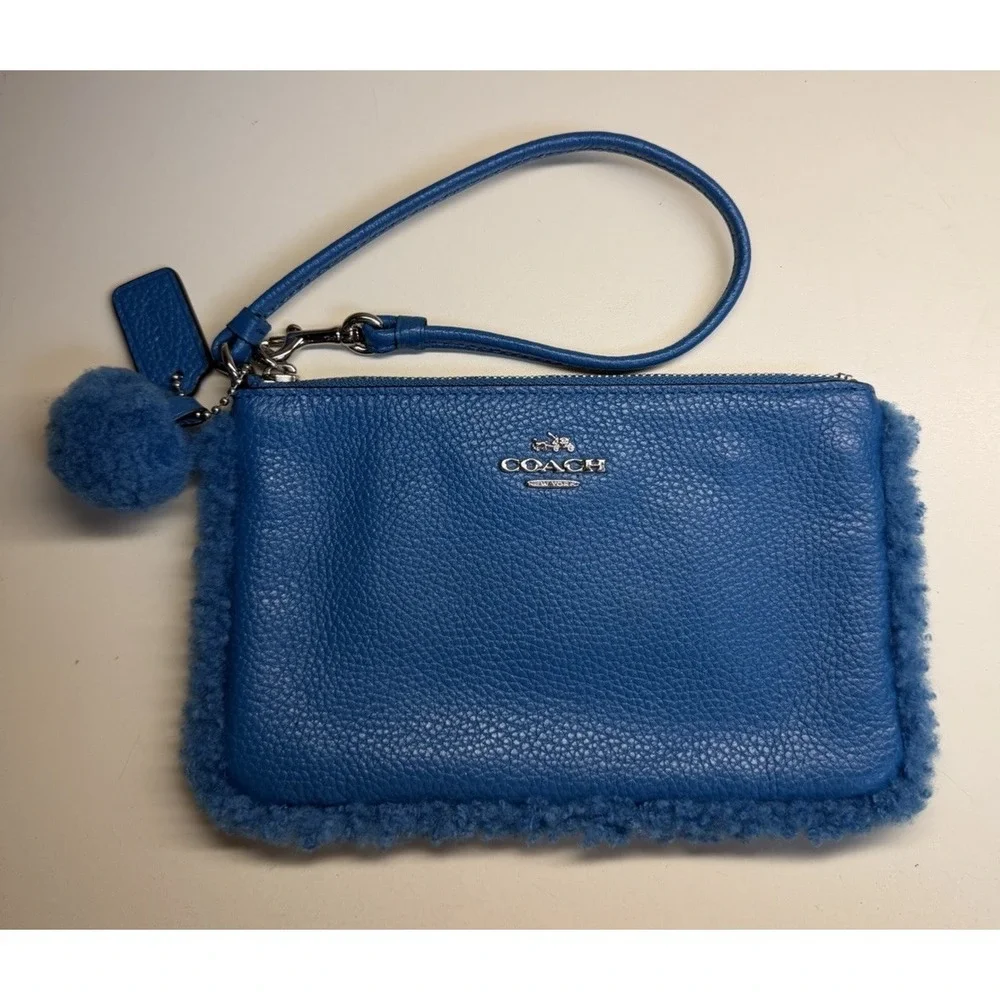 Coach Nolita Small Wristlet in Peacock Blue Pebble Leather with‎ Shearling Trim